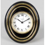 A Cartier quartz desk clock of oval shaped easel form,