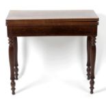 A mahogany fold over card table,