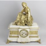 A late 19th century gilt bronze and white marble mantel clock,