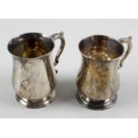 Two George III small silver mugs,