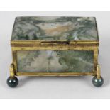 A 19th century gilt metal mounted and moss agate panelled miniature casket,