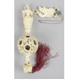 A 19th century carved ivory puzzle ball,