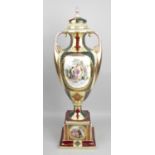 An early 20th century Royal Vienna porcelain twin handled pedestal vase,