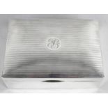 A twentieth century silver mounted table cigarette box of plain rectangular form,