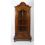 A reproduction walnut display cabinet,