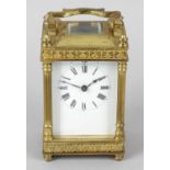 An early 20th century gilt metal cased carriage clock,