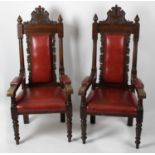 An early 20th century Spencer and Co of London stained carved oak framed Masonic Masters chair,