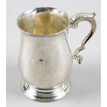 A George III silver pint mug,