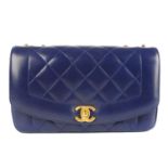 CHANEL - a blue Diana quilted handbag.