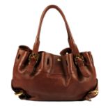 BURBERRY - a brown leather handbag.