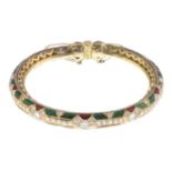 An Indian enamel and diamond hinged bangle.