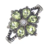 A diamond and peridot cluster ring.