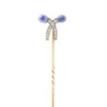 An early 20th century sapphire and diamond stickpin.