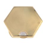 A mid 20th century 9ct gold compact.