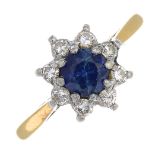 A sapphire and diamond floral cluster ring.