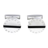 BULGARI - a pair of silver onyx 'Pan Coupe' cufflinks.