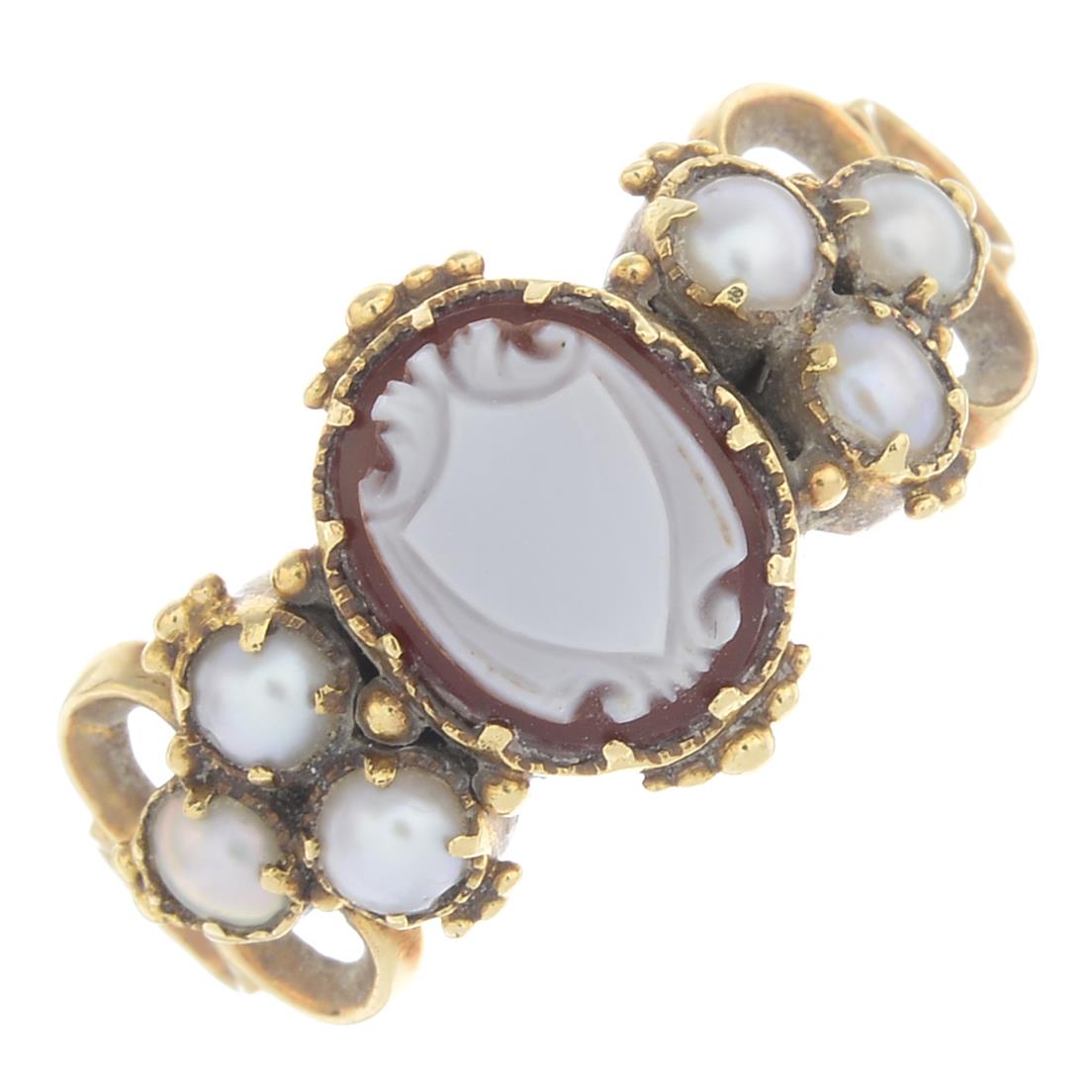 A mid Victorian gold sardonyx and split pearl ring.