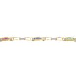 An 18ct gold diamond and gem-set bracelet.