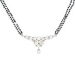 A diamond and gem-set necklace.