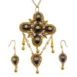 A mid Victorian gold garnet and split pearl necklace and earrings.