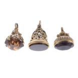 Three 9ct gold gem-set fobs.