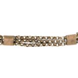 A bracelet. Designed as a belcher-link three-row chain,