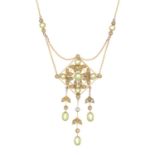 An Edwardian 15ct gold peridot and split pearl necklace.