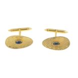 A pair of 18ct gold sapphire cufflinks.