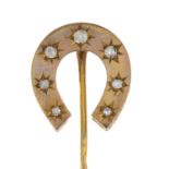 A late Victorian diamond horseshoe stickpin.