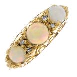 An 18ct gold opal and diamond ring.