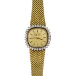 A lady's diamond wrist watch.