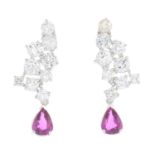 A pair of diamond and ruby earrings.