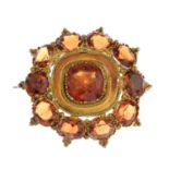 A late Georgian gold hessonite garnet brooch, circa 1830.