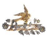 A diamond and gem-set brooch.