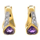 A pair of amethyst and diamond earrings.