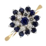 An 18ct gold sapphire and diamond cluster ring.