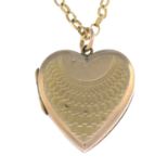 A locket. Of heart-shape outline,