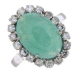 A jade and diamond cluster ring.