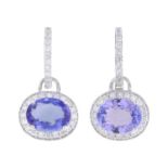 A pair of tanzanite and diamond earrings.