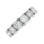 A diamond and emerald full eternity ring.