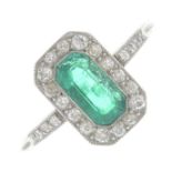 An early 20th century platinum, Colombian emerald and diamond cluster ring.