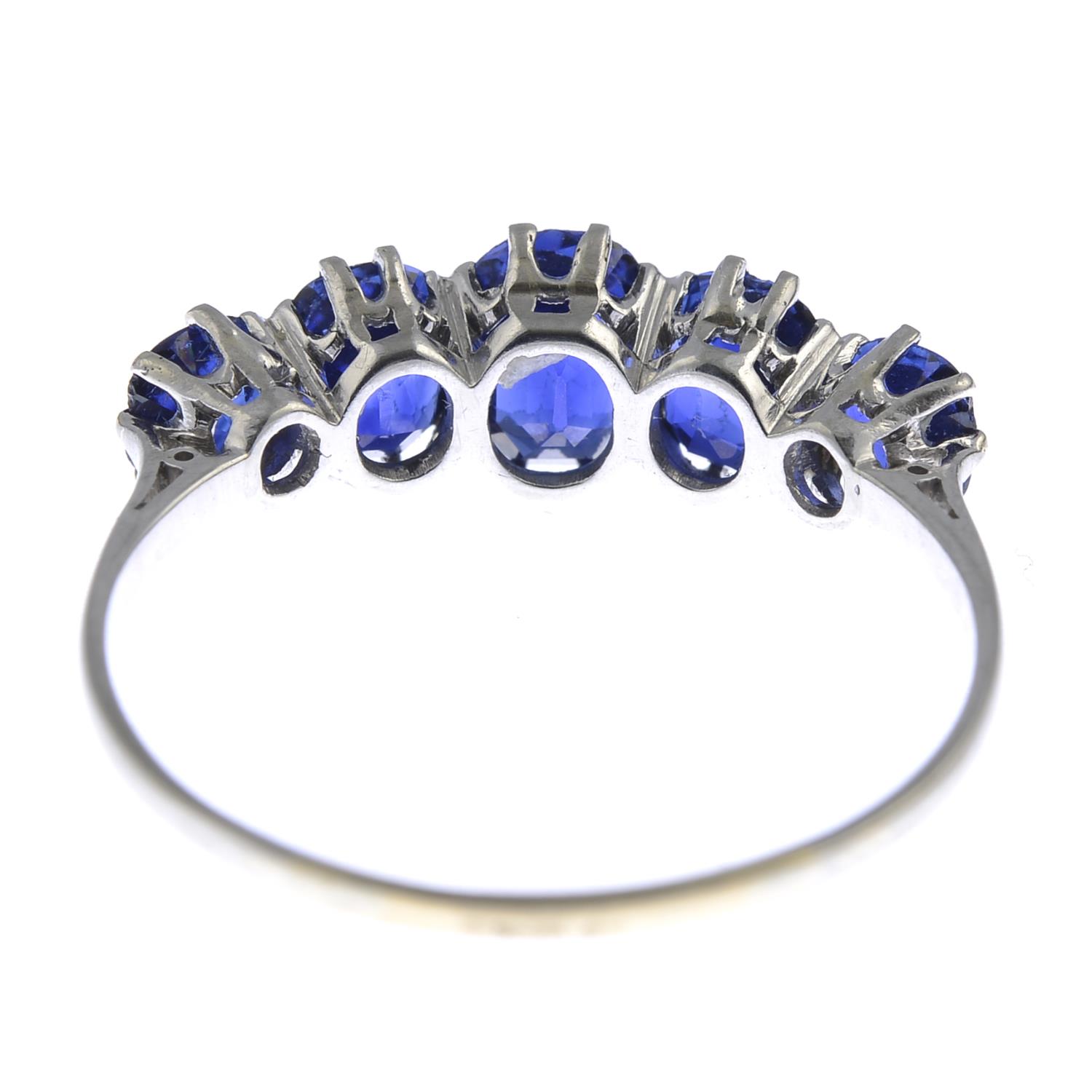 An early 20th century platinum and gold, sapphire five-stone ring. - Image 4 of 4