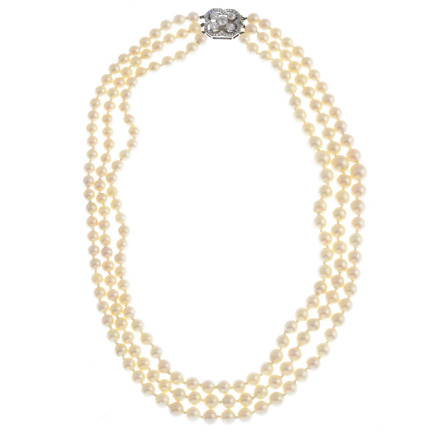 A cultured pearl necklace. Comprising three strands of cultured pearls ...