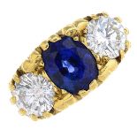 An 18ct gold sapphire and diamond three-stone ring.