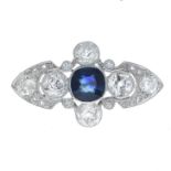 A sapphire and diamond brooch.