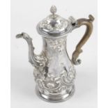 An early George III silver coffee pot,