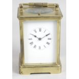 A late 19th century brass cased repeater carriage clock,