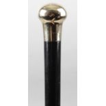 An early 20th century gentleman's 15ct gold topped walking cane,