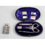 A late Victorian silver mounted part sewing set,