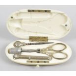 A late 19th century ivory cased necessaire,